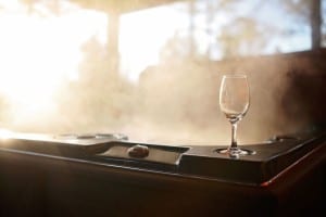 wine glass on steaming hot tub