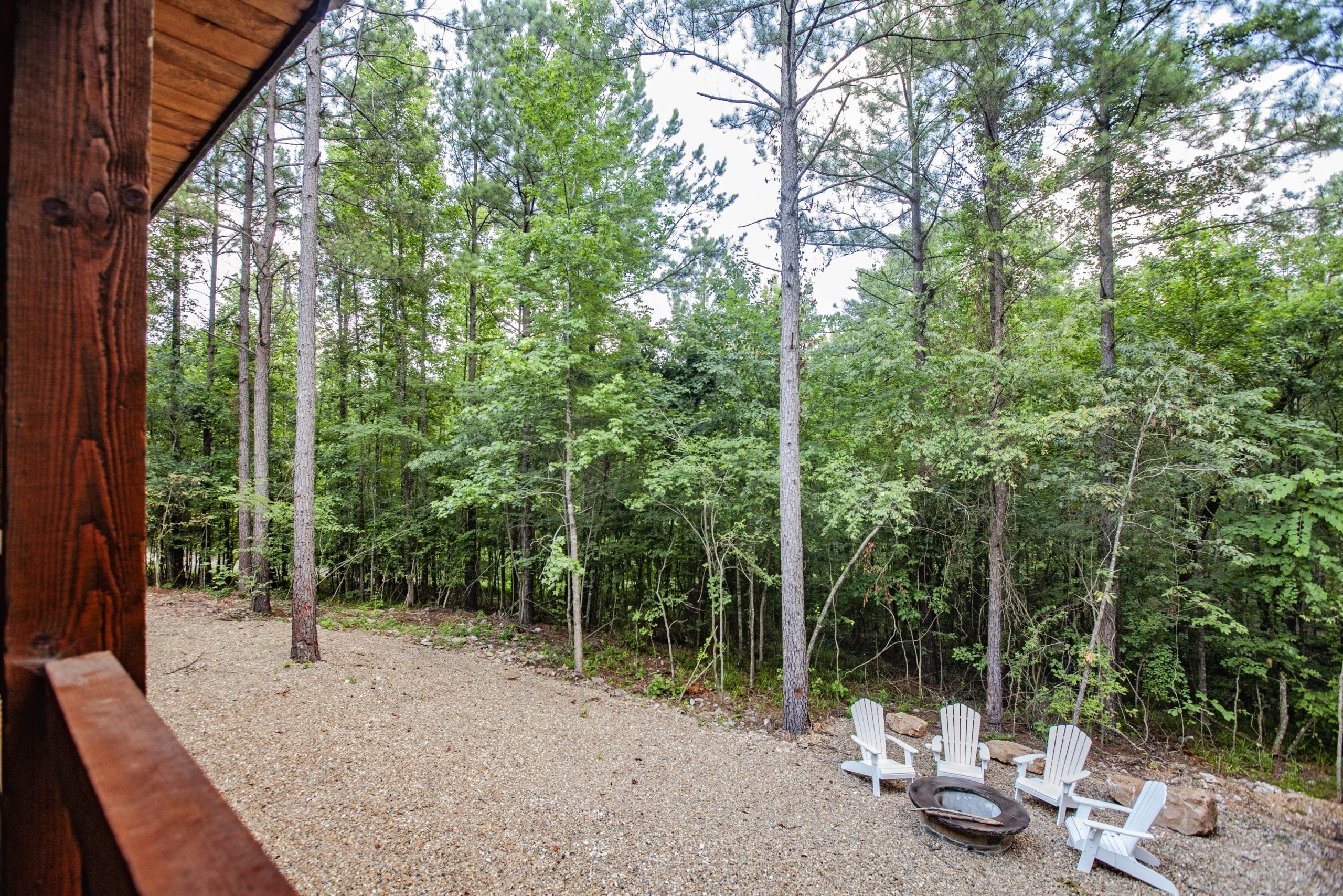 Broken Bow Cabins Texas Time firepit and Adirondack chairs Blue