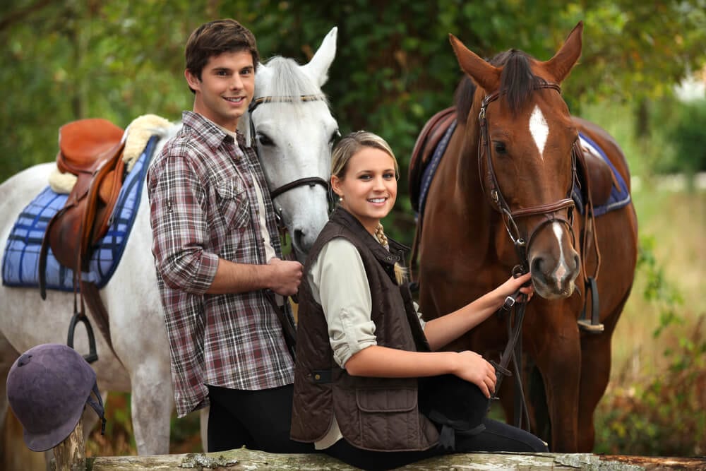 Photo of a Couple About to Go Horseback Riding in Broken Bow, OK.