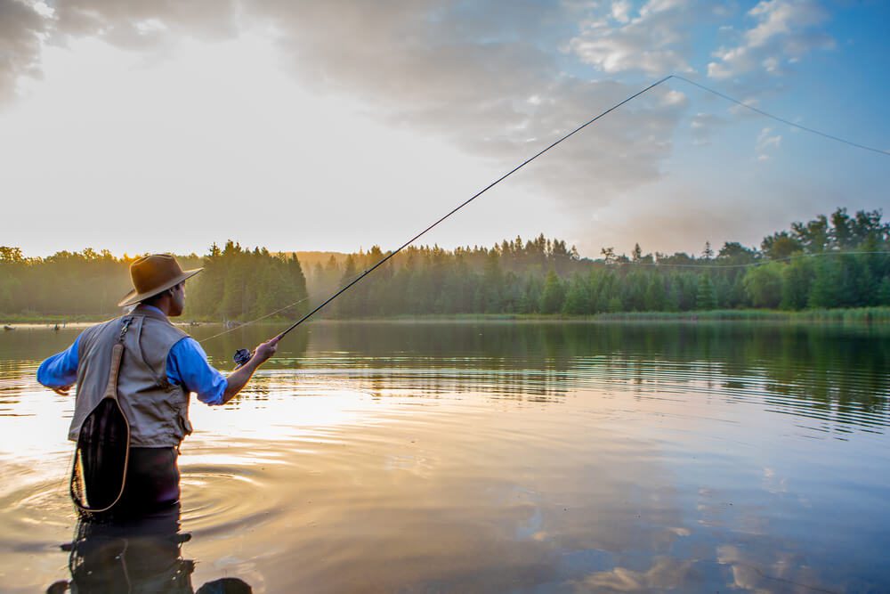 A man fly fishing in Broken Bow