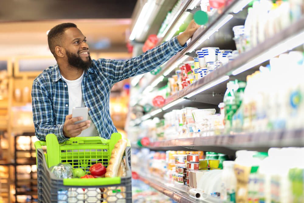 A man shopping at a grocery store in Broken Bow, OK