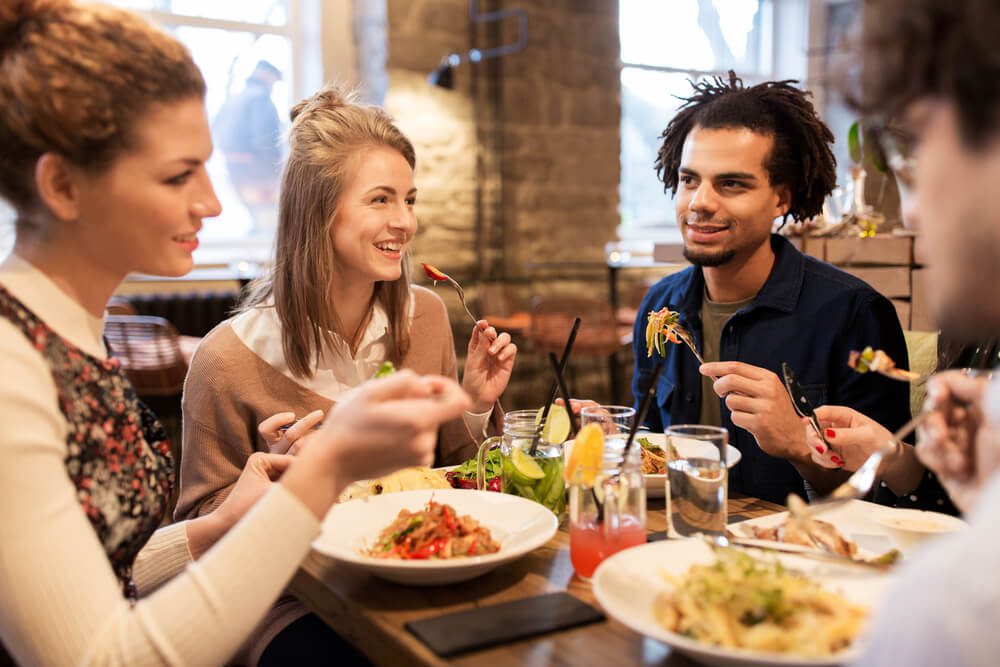 Friends enjoying a meal at one of Hochatown's restaurants